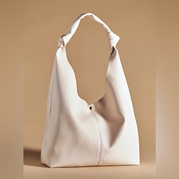 Anthropologie Handbags - NWOT By Anthropologie The Love Knot Slouchy Bag in Cream
